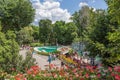 Budapest zoo with people at footpath surrounded with beautiful flowers
