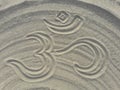 Buddah symbol in the sand