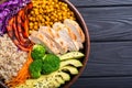 Buddha bowl with avocado chicken , pepper , quinoa and chickpea . Healthy food