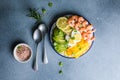 Buddha bowl with avocado, prawns, rice, on light background. Healthy food, clean eating, Buddha bowl, top view Royalty Free Stock Photo