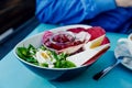 Buddha Bowl with field salad, corn salad or lamb`s lettuce, brown rice, spinach, chives, organic egg, beets, jam and cheese Royalty Free Stock Photo