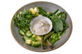 Buddha bowl green vegan food. Beans, asparagus, avocado, quail eggs and spinach. A healthy nutritious diet snack. Royalty Free Stock Photo