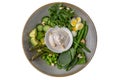 Buddha bowl green vegan food. Beans, asparagus, avocado, quail eggs and spinach. A healthy nutritious diet snack. Royalty Free Stock Photo