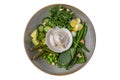 Buddha bowl green vegan food. Beans, asparagus, avocado, quail eggs and spinach. A healthy nutritious diet snack. Royalty Free Stock Photo