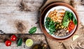 Buddha bowl with kale salad, quinoa, chicken fillet, chickpeas, avocado, spinach, tomatoes cherries, nuts arugula, Clean eating, Royalty Free Stock Photo