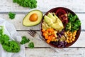 Healthy Buddha bowl on white wood. Top view scene. Royalty Free Stock Photo