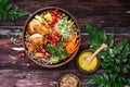 Buddha Bowl with Quinoa, Avocado, Roasted Chicken, Broccoli, Carrots and Turmeric Sauce Royalty Free Stock Photo