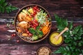 Buddha Bowl with Quinoa, Avocado, Roasted Chicken, Broccoli, Carrots and Turmeric Sauce