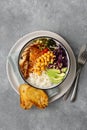 Buddha bowl Rice chickpeas chicken breast eggs vegetables top view