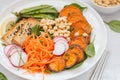 Buddha bowl with vegetables, tofu, baked sweet potato, sprouts c Royalty Free Stock Photo