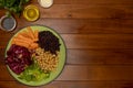 Buddha bowl on wooden table. Vegetarian and vegan food. Royalty Free Stock Photo