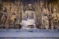 The Buddha Buddha of Fengxian Temple in Longmen Grottoes, Luoyang, China, and his four great disciples Royalty Free Stock Photo