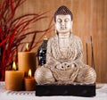 Buddha with candle, vivid colors, natural tone Royalty Free Stock Photo