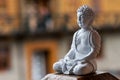 Buddha ceramic statue. Yoga, buddhism, meditation background with empty space for text