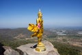 Buddha on cliff of Khao Phraya Doen Thong mountain for thai people travelers travel visit trail trekking go to respect praying