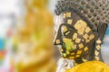Buddha face on blurry background Royalty Free Stock Photo