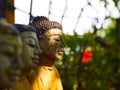Buddha face in a garden. Royalty Free Stock Photo