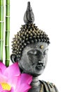Buddha face with lotus flower and bamboo stem Royalty Free Stock Photo