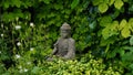 Buddha figure in a Spring Garden