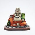 buddha fragile ceramic lucky statue in a white background