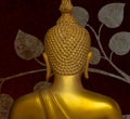 Buddha gold statue on golden background patterns Thailand. Royalty Free Stock Photo