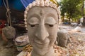 Buddha head made of cement in a Thai temple Royalty Free Stock Photo