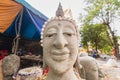 Buddha head made of cement in a Thai temple Royalty Free Stock Photo