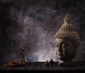 Buddha head statue, incense and sandalwood beads rosary. Royalty Free Stock Photo