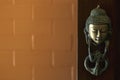 Buddha head stuck at the door