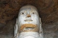 Buddha head at Yungang Grottoes near Datong in Shanxi Province, China Royalty Free Stock Photo