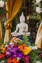 Buddha image and flowers Royalty Free Stock Photo