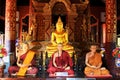 Buddha Image And Monk In Wat Phra Singh, Chiang Mai, Thailand