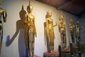 Buddha images in the cloister. The cloister is intersected with four viharas or viharns, in Wat Pho, Bangkok, Thailand. Royalty Free Stock Photo