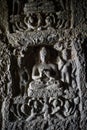 Buddha meditating carved on the wall of Aurangabad Cave