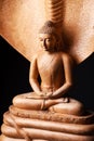 Buddha in a meditation pose, under protection of the Muchalinda Royalty Free Stock Photo