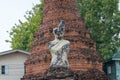 Ruined Buddha mounument in Wat Suwannawas in Ayutthaya, Thailand