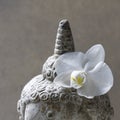 Buddha with orchid