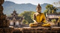 A buddha sculpture with a backdrop of temple architecture Royalty Free Stock Photo