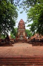 Buddha sculptures made of stone on the brick ruins of Wat Phra Sri Sanphet. Ayutthaya, Thailand.