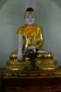Buddha seated Statue at Shwedagon Pagoda.