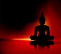 Buddha silhouette against red background