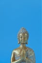 Buddha statue on a blue background.Meditation and relaxation .Buddhism religion background.Buddhism religion .Meditation Royalty Free Stock Photo