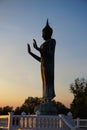 Buddha statue with blue sky at Khun Samut Trawat temple Thailand