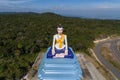 Buddha statue in Bokor hillstation in Kampot Cambodia , Bokor national park cambodia Aerial drone Photo Royalty Free Stock Photo