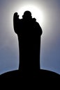 Buddha statue with clouds background
