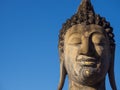 Buddha statue face portrait with Blue sky background Art Religion Royalty Free Stock Photo
