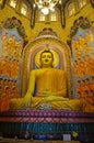 Buddha Statue in Gangaramaya Vihara Buddhist Temple , Colombo , Sri Lanka