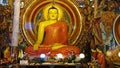 Buddha Statue in Gangaramaya Vihara Buddhist Temple , Colombo , Sri Lanka