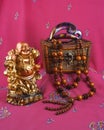 Buddha statue, hairpin, beads made of wood, jewelry box Royalty Free Stock Photo