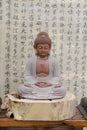Buddha statue and the heart sutra Royalty Free Stock Photo